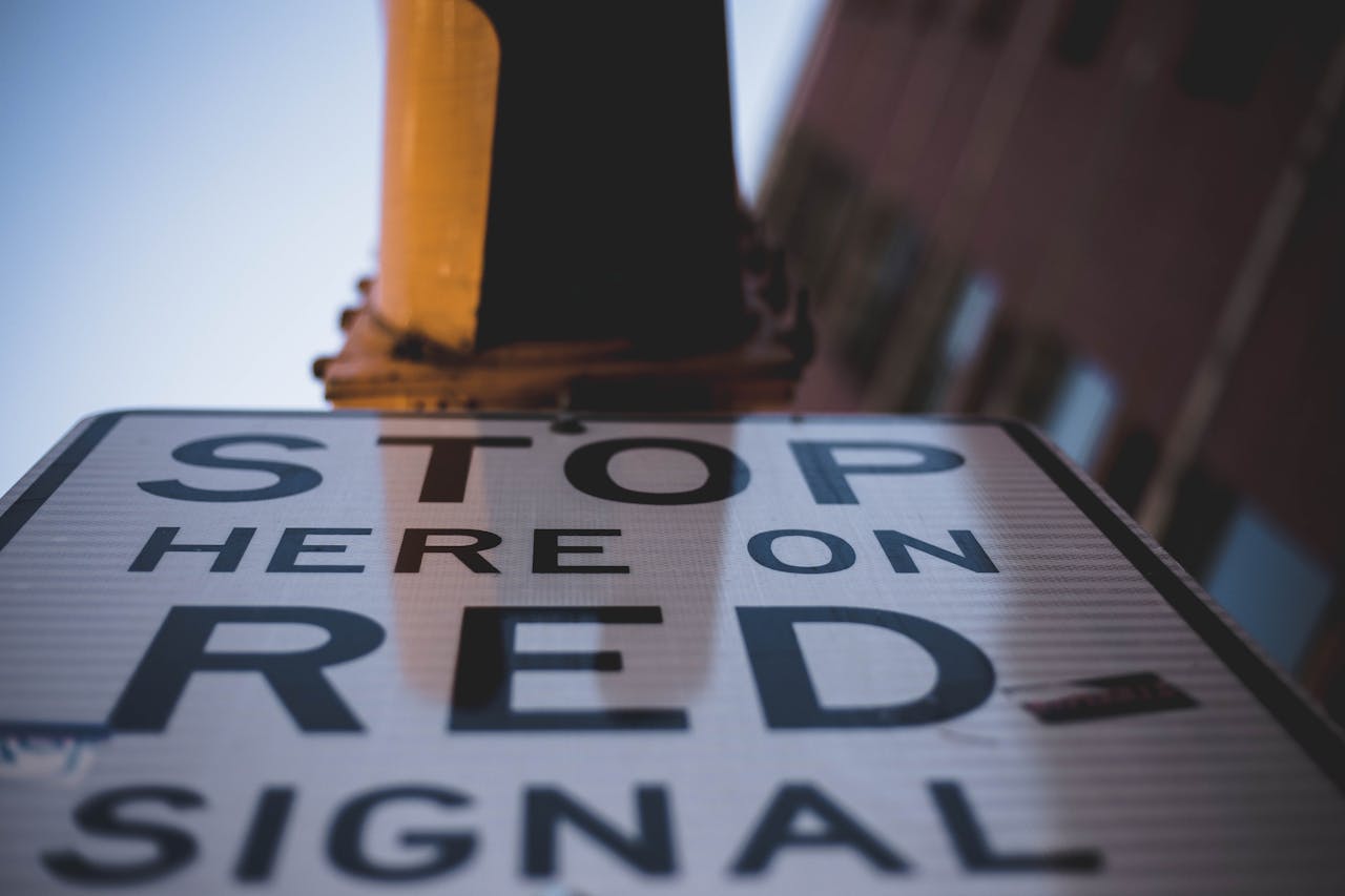 Worm's-eye View Photography Of Stop Signage